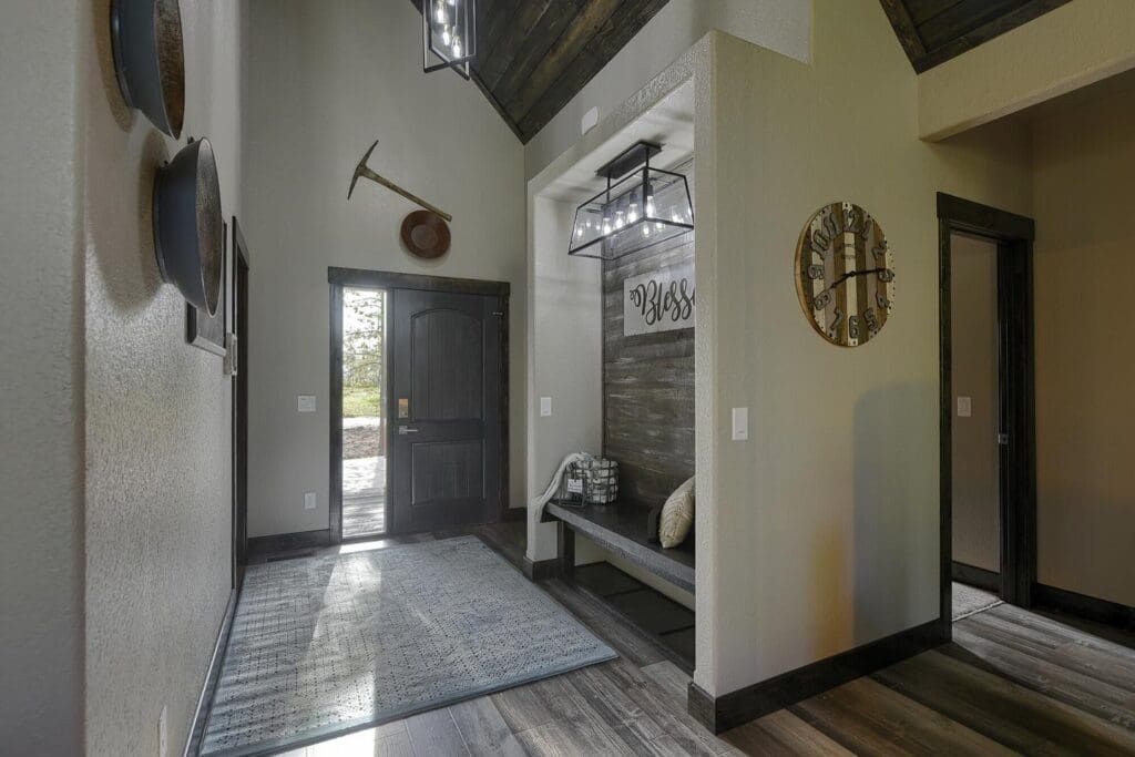 Home interior walkway by front door with new residential white paint